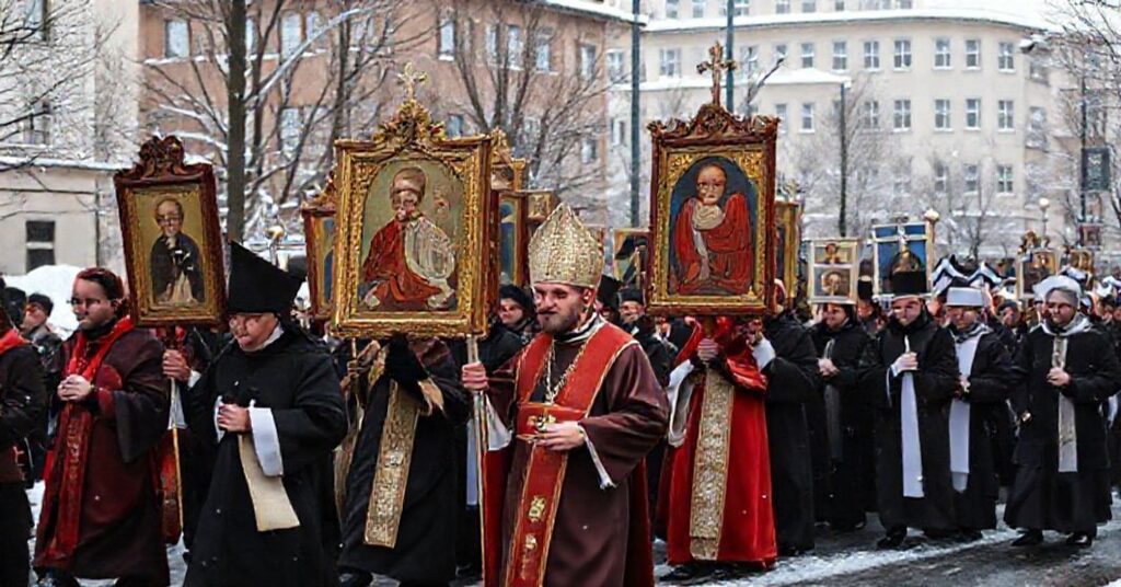 A solemn procession in Finland where Catholic statues and Orthodox icons are carried together under Lutheran approval