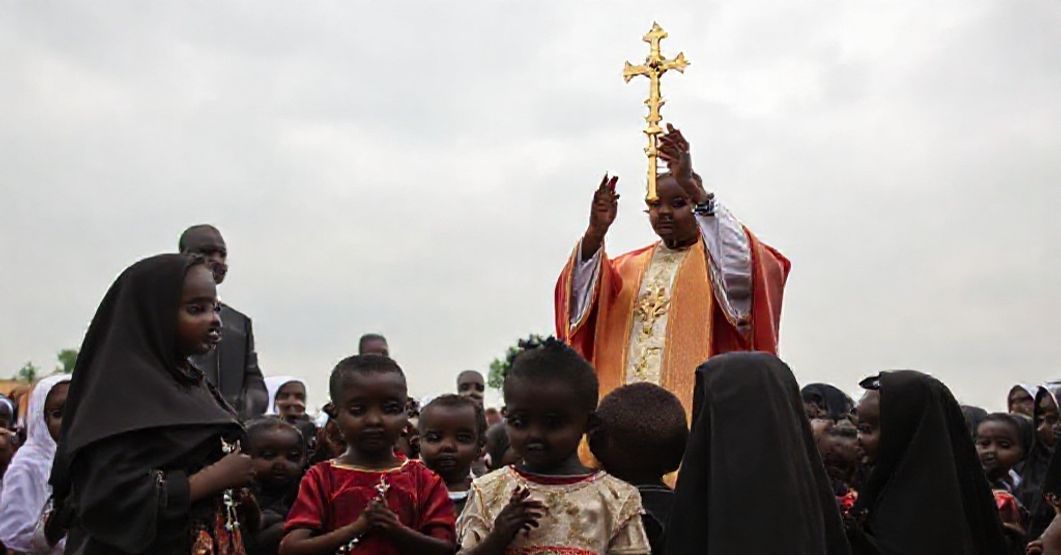 A sedevacantist priest in traditional vestments holds a monstrance with the Blessed Sacrament during the release of abducted children from St. Mary's School in Nigeria.