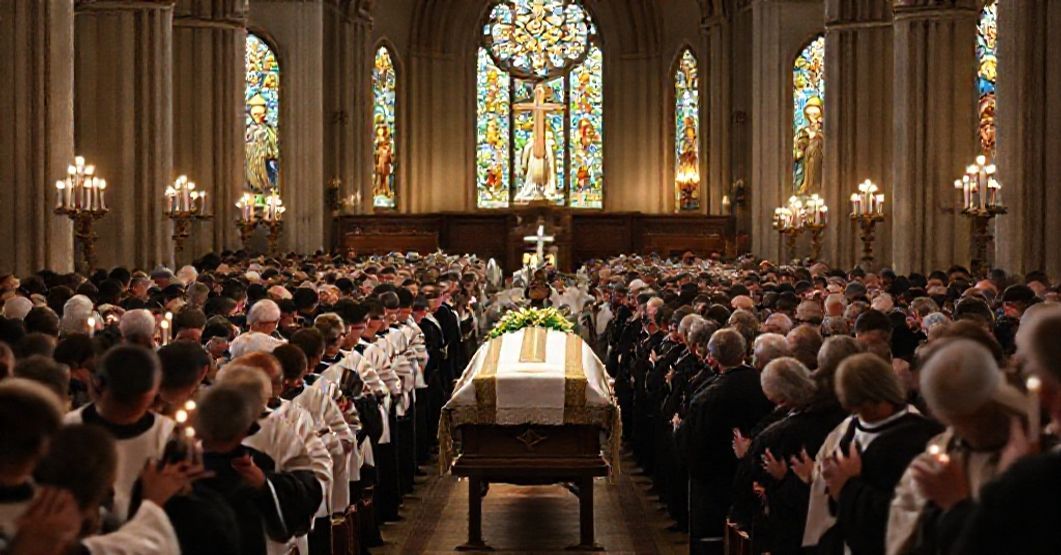 Traditional Catholic Funeral for Father Stephen Gutgsell A solemn Catholic funeral procession for Father Stephen Gutgsell in St. Cecilia Cathedral, Omaha, emphasizing traditional liturgy and sacramental reality.